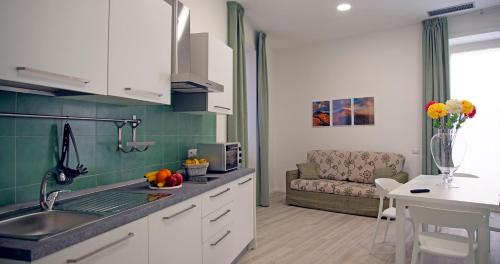 Η κουζίνα ή μικρή κουζίνα στο Casa Rachele Napoli