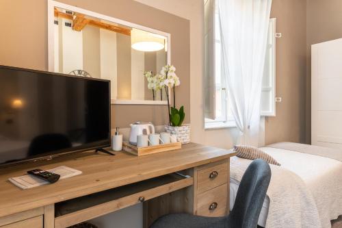 TV a/nebo společenská místnost v ubytování B&B Stella Lucca
