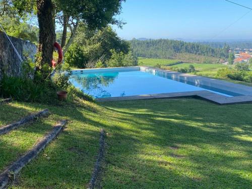 Bazén v ubytování Lovely 6-Bed Cottage in Barcelos - Vila Cova nebo v jeho okolí