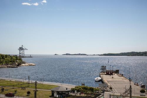 a view of a large body of water with a dock at Quality Hotel Grand Larvik in Larvik