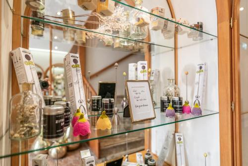 a glass display case in a store with items at Cityhotel Trumer Stube in Salzburg