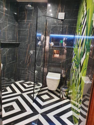 Bilik mandi di Kamelia guest rooms