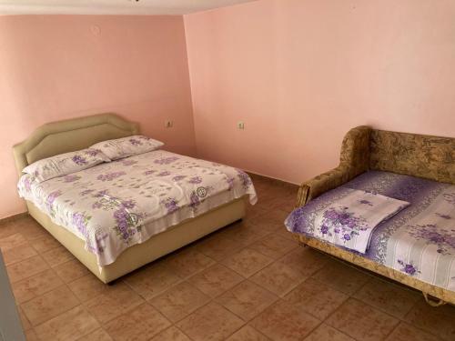 Postel nebo postele na pokoji v ubytování Apartman Anci