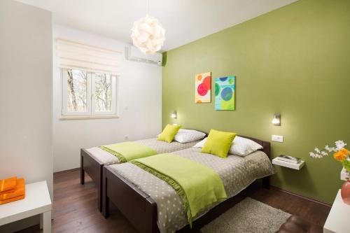 Postel nebo postele na pokoji v ubytování Villa Vivian by Villa Plus