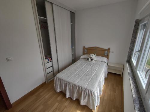 Posteľ alebo postele v izbe v ubytovaní Casa Chouza