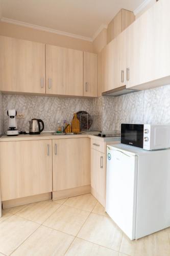 Η κουζίνα ή μικρή κουζίνα στο DPark Apartament