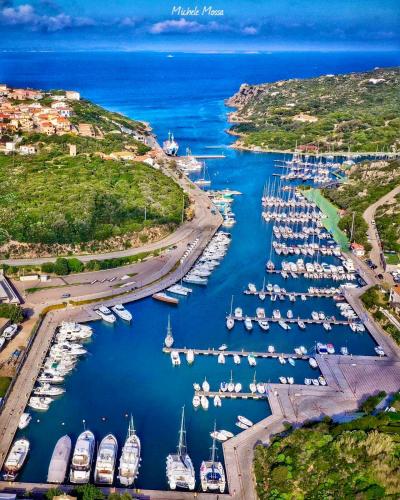 an aerial view of a marina with boats in the water at Villa Franci in Santa Teresa Gallura