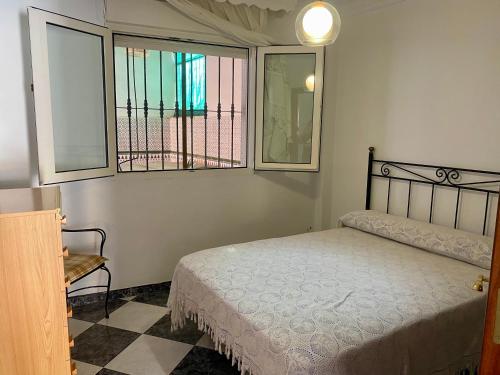 Ένα ή περισσότερα κρεβάτια σε δωμάτιο στο Casa Nati