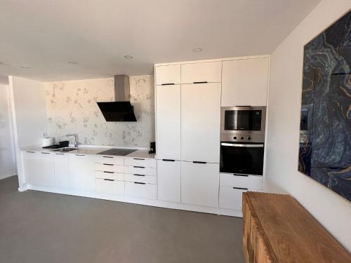 Dapur atau dapur kecil di Penthouse sea view