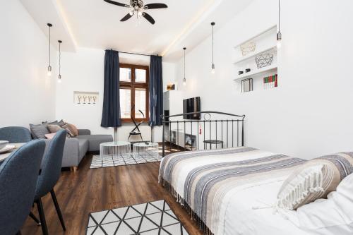 Posteľ alebo postele v izbe v ubytovaní City of the Kings - Old Depot Apartment