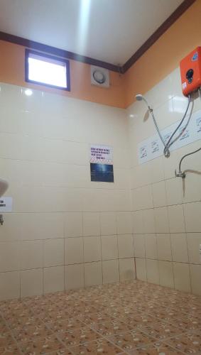 Ein Badezimmer in der Unterkunft Phatra Hostel