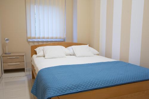 Jana apartmaniにあるベッド