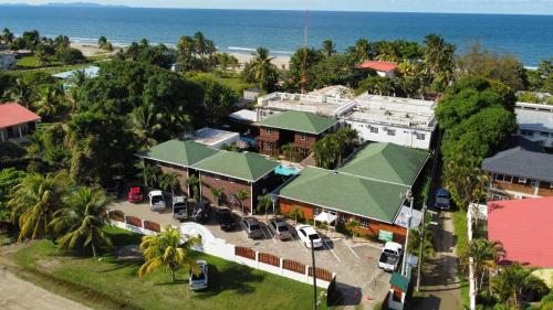 an aerial view of a resort with the ocean at Hotel Playa Caribe in Tela