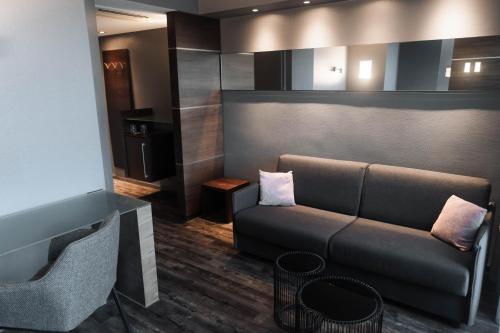 Гостиная зона в Hotel am Augustinerplatz