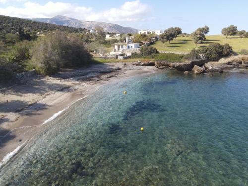 an aerial view of a beach and the ocean at Sarris Ligaridia Apartments in Naxos Chora