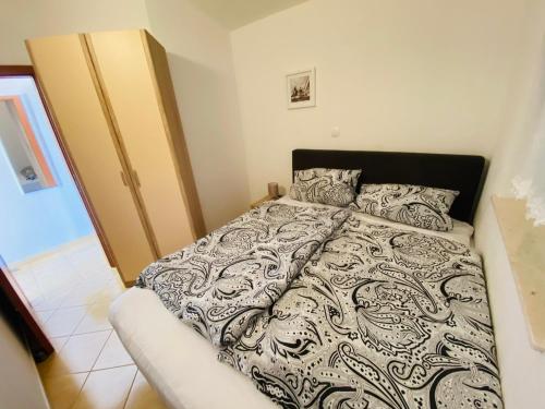 Katil atau katil-katil dalam bilik di Apartmani-joe