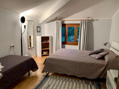 A bed or beds in a room at AL CLISI graziosa mansarda