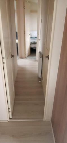 Ένα ή περισσότερα κρεβάτια σε δωμάτιο στο Caledonian Caravan