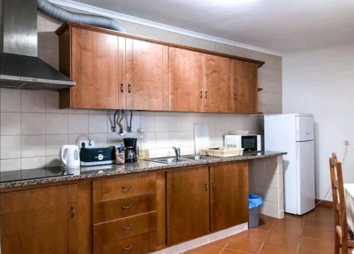 Кухня или мини-кухня в Sudoeste Guest House
