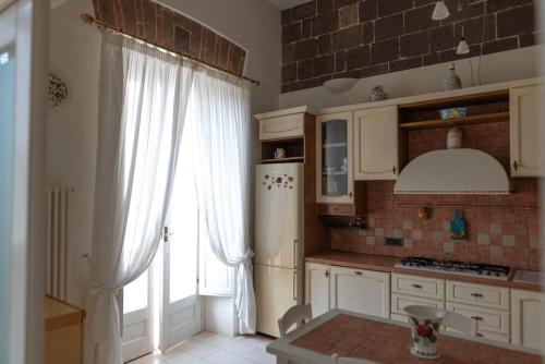 Η κουζίνα ή μικρή κουζίνα στο Ercole Luxury Flat