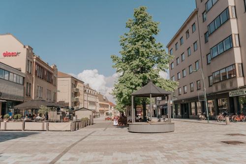 a christmas tree in the middle of a city street at The Sunset - Top Floor Studio apartment in Pietarsaari