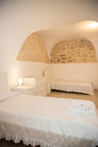 Ένα ή περισσότερα κρεβάτια σε δωμάτιο στο Casa di Gio