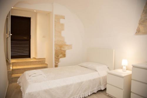Ένα ή περισσότερα κρεβάτια σε δωμάτιο στο Casa di Gio