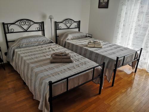 Giường trong phòng chung tại La Posada sul Colle