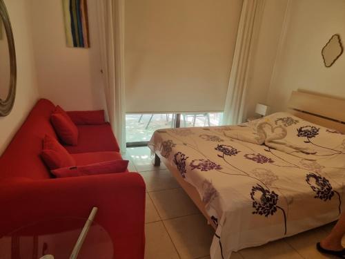 Ένα ή περισσότερα κρεβάτια σε δωμάτιο στο LightHouse View Villa