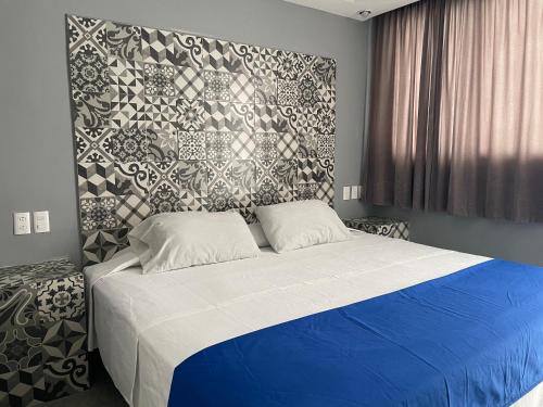 Postel nebo postele na pokoji v ubytování Hotel Rias