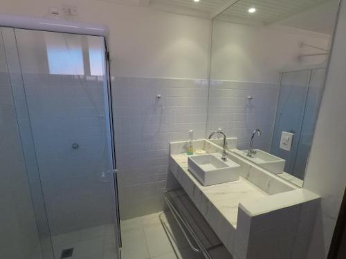 Ένα μπάνιο στο Beach House Prumirim