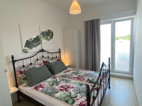 Katil atau katil-katil dalam bilik di Apartment Anita 3
