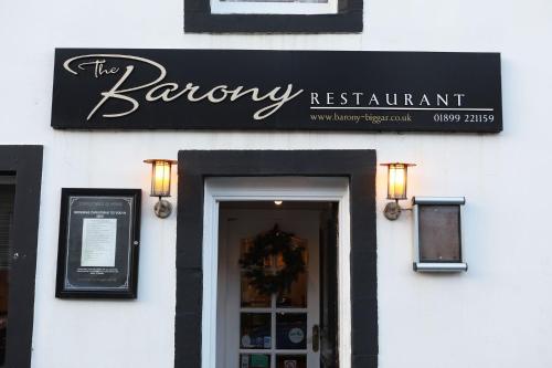 a sign for a bowing restaurant on a building at Garden Studio in Biggar in Biggar