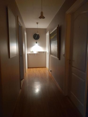 an empty room with a hallway with a light on the wall at Country Dream - Langholt 2 in Selfoss