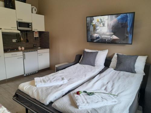 a room with two beds and a kitchen at Country Dream - Langholt 2 in Selfoss