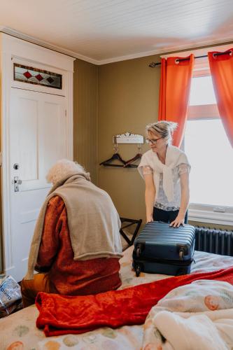 Postel nebo postele na pokoji v ubytování Auberge Bruine Océane