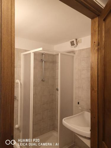 a bathroom with a shower and a sink at Mulini di Verrucole in Naggio
