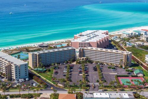 an aerial view of a resort next to the ocean at The Islander 412 in Destin