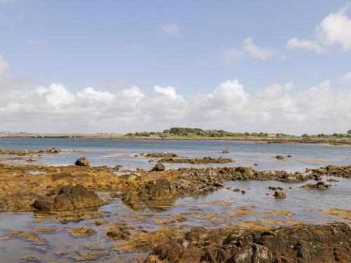 a large body of water with rocks in it at Prague House in Lettermore