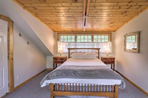 A bed or beds in a room at Spectacular Views with Deck, Fire Pit, and Game Room!