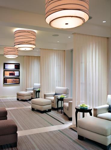 a waiting room with couches and chairs and lights at Ameristar Casino Black Hawk in Black Hawk