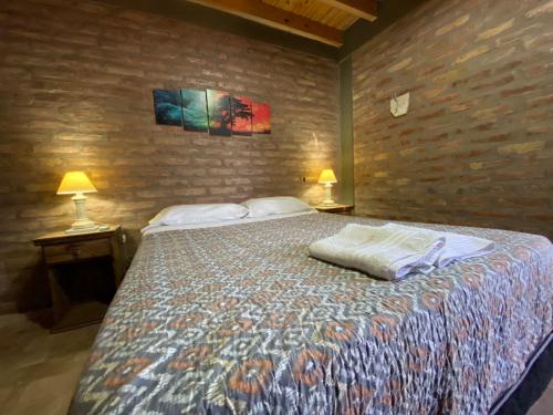 Postel nebo postele na pokoji v ubytování Apart Conector Sur