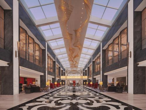 a rendering of a lobby with a large ceiling at Gran Melia Xi'an in Xi'an