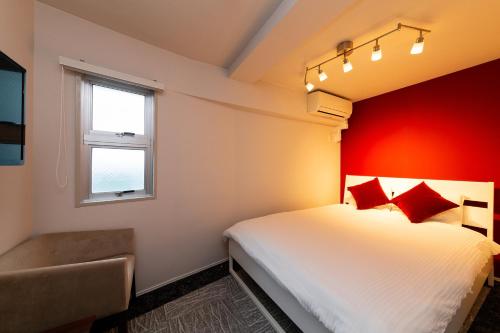 Cama o camas de una habitación en Stay Hakata