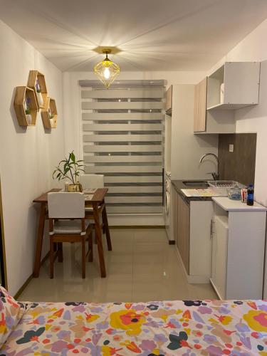 Kuchyň nebo kuchyňský kout v ubytování Estudio elegante y cálido