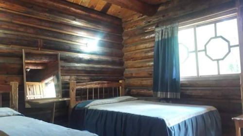 Postel nebo postele na pokoji v ubytování Parador Arew La Energa Que Impulsa El Alma