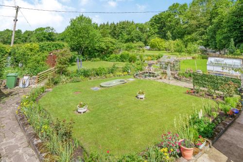 an aerial view of a garden with plants and flowers at Kavieng in Crickhowell