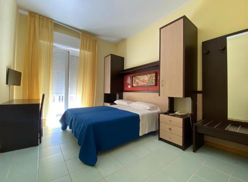 Postel nebo postele na pokoji v ubytování Hotel Plaza con piscina