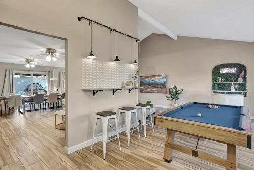 a living room with a pool table in it at Scottsdale Designer Oasis - Private Pool & Insta Getaway in Scottsdale