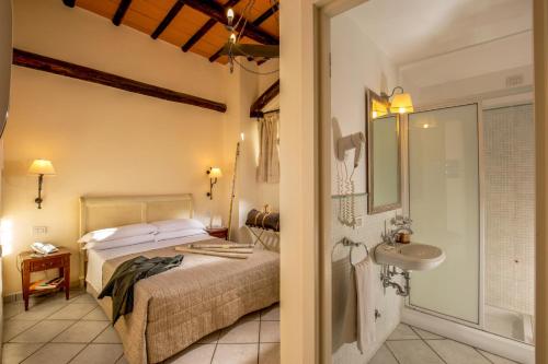 Кровать или кровати в номере Hotel Selva Candida